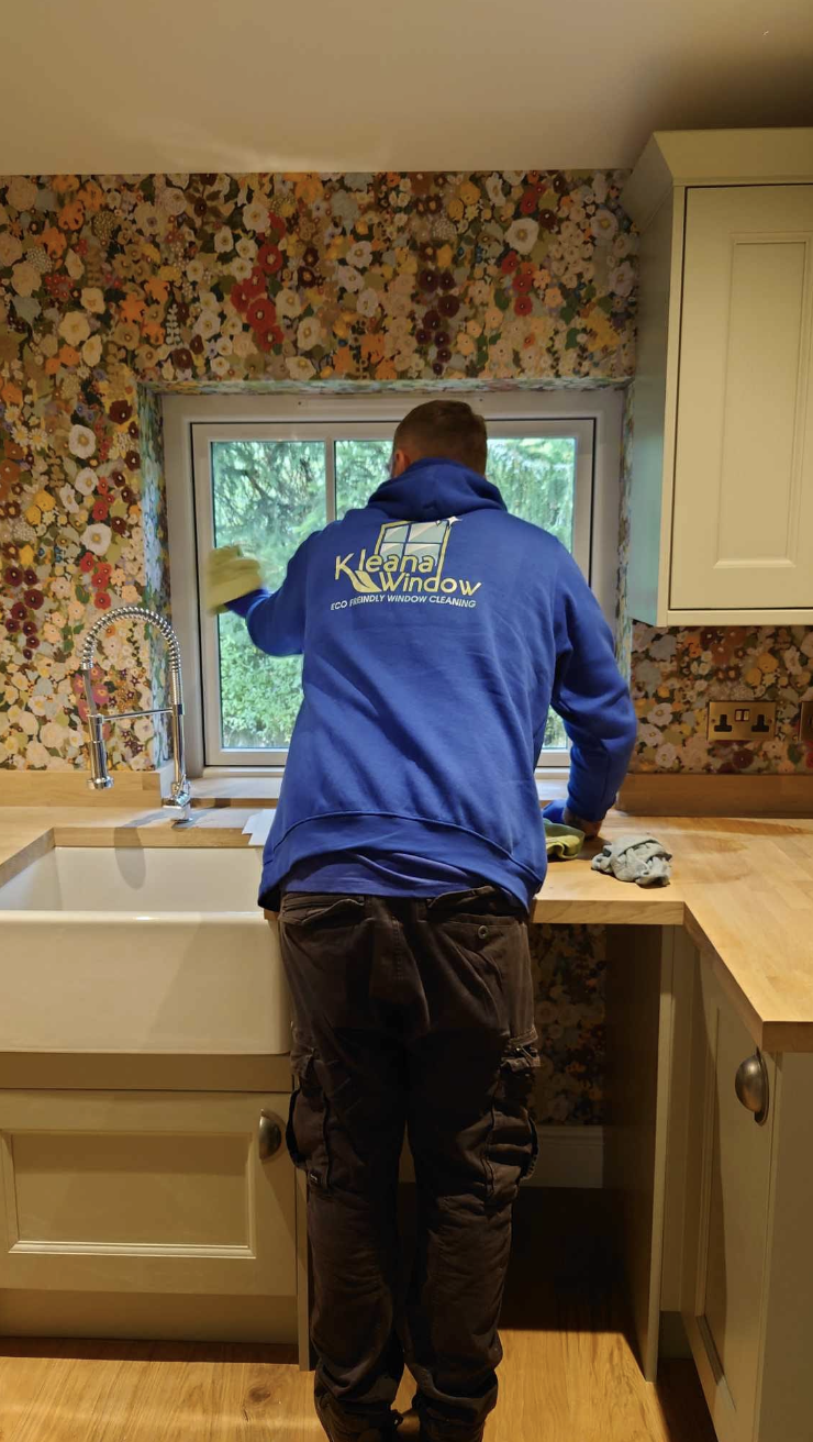 Window cleaning service in the Scottish Highlands - Kleana Window professional at work